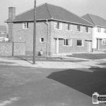 Could this be 115 Hawkins Road? It is on a junction corner like Google Street view shows today.